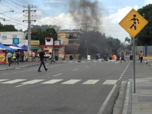Fuertes disturbios en la UASD; hieren foto reportero elCaribe 