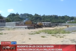 Residentes en Los Guandules defienden construcción escuela a orillas del rio Ozama