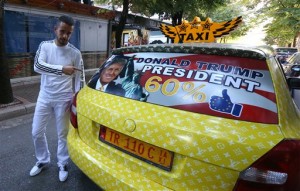 Albania: Decora taxi con fotos de Trump 