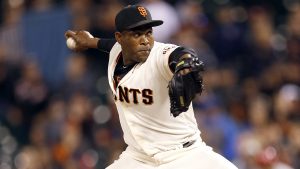 San Francisco Giants relief pitcher Santiago Casilla throws against the Cincinnati Reds during the ninth inning of a baseball game in San Francisco, Tuesday, July 26, 2016. San Francisco won 9-7. (AP Photo/Tony Avelar)