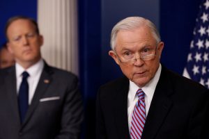 U.S. Attorney General Jeff Sessions (R) joins White House Press Secretary Sean Spicer (L) for the daily press briefing at the White House in Washington, U.S., March 27, 2017.  REUTERS/Jonathan Ernst