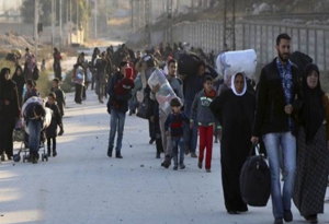 Siria inicia traslado masivo de civiles pactado con rebeldes