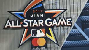 FILE - In this Wednesday, July 27, 2016, file photo, Miami Marlins mascot Billy the Marlin waves after unveiling the official logo for the 2017 All-Star Game that will be held in Miami, during a ceremony before the start of a baseball game between the Miami Marlins and the Philadelphia Phillies in Miami. The league that wins baseball's All-Star Game no longer will get home-field advantage in the World Series, which instead will go to the pennant winner with the better regular-season record. The change was included in Major League Baseball's tentative new collective bargaining agreement and disclosed early Thursday, Dec. 1, to The Associated Press by a person familiar with the agreement. The person spoke on condition of anonymity because details of the deal, reached Wednesday evening in Irving, Texas, had not been announced. (AP Photo/Wilfredo Lee, File)