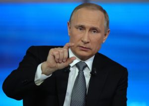 Russian President Vladimir Putin gestures during his annual televised call-in show in Moscow on Thursday, April 14, 2016. (Sputnik, Kremlin Pool Photo via AP)