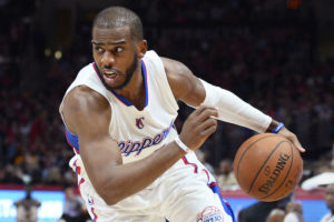 epa04615362 Los Angeles Clippers Chris Paul (R) works against Houston Rockets James Harden (L) in second half action of their NBA basketball game in Los Angeles, California, USA, 11 February 2015. The Clippers beat the Rockets.  EPA/PAUL BUCK CORBIS OUT