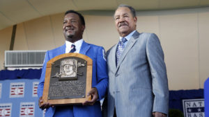 National Baseball Hall of Fame inductee Pedro Martinez, left, poses with countryman and fellow Hall of Famer Juan Marichal during an induction ceremony at the Clark Sports Center on Sunday, July 26, 2015, in Cooperstown, N.Y. (AP Photo/Mike Groll)