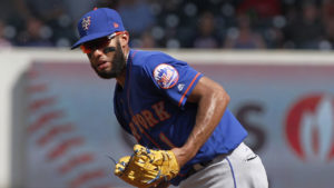 New York Mets' shortstop Amed Rosario drops the ball for an error in the seventh inning of a baseball game against the Atlanta Braves in Atlanta, Sunday, Sept. 17, 2017. (AP Photo/Tami Chappell)
