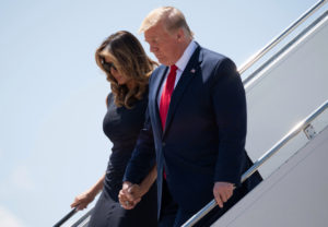 US President Donald Trump and First Lady Melania Trump disembark from Air Force One upon arrival at El Paso International Airport in El Paso, Texas, August 7, 2019, as he travels to Dayton, Ohio and El Paso, Texas, following last weekends mass shootings. (Photo by SAUL LOEB / AFP)