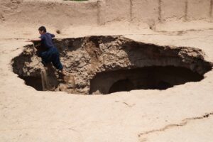 Gozara District (Afghanistan), 06/05/2021.- A man surveys a house that was damaged in flash EFE/EPA/JALIL REZAYEE
